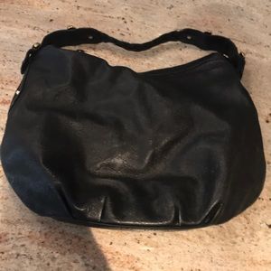 Black leather Gucci bag.